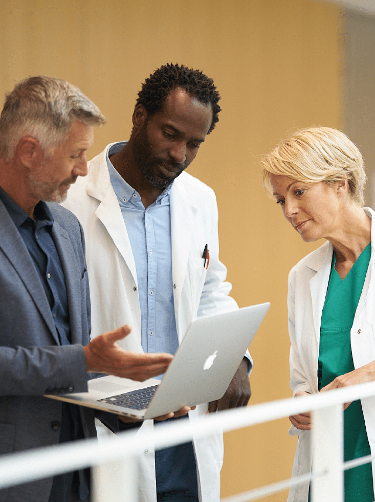 Molecular-Imaging-three-people-checking-laptop